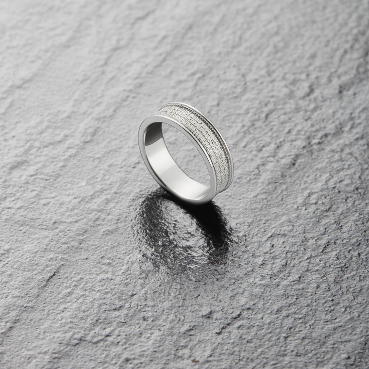Protective ring bearing the words of the Lord’s Prayer