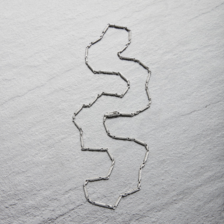 “Engraved designs” (thin)  Chain